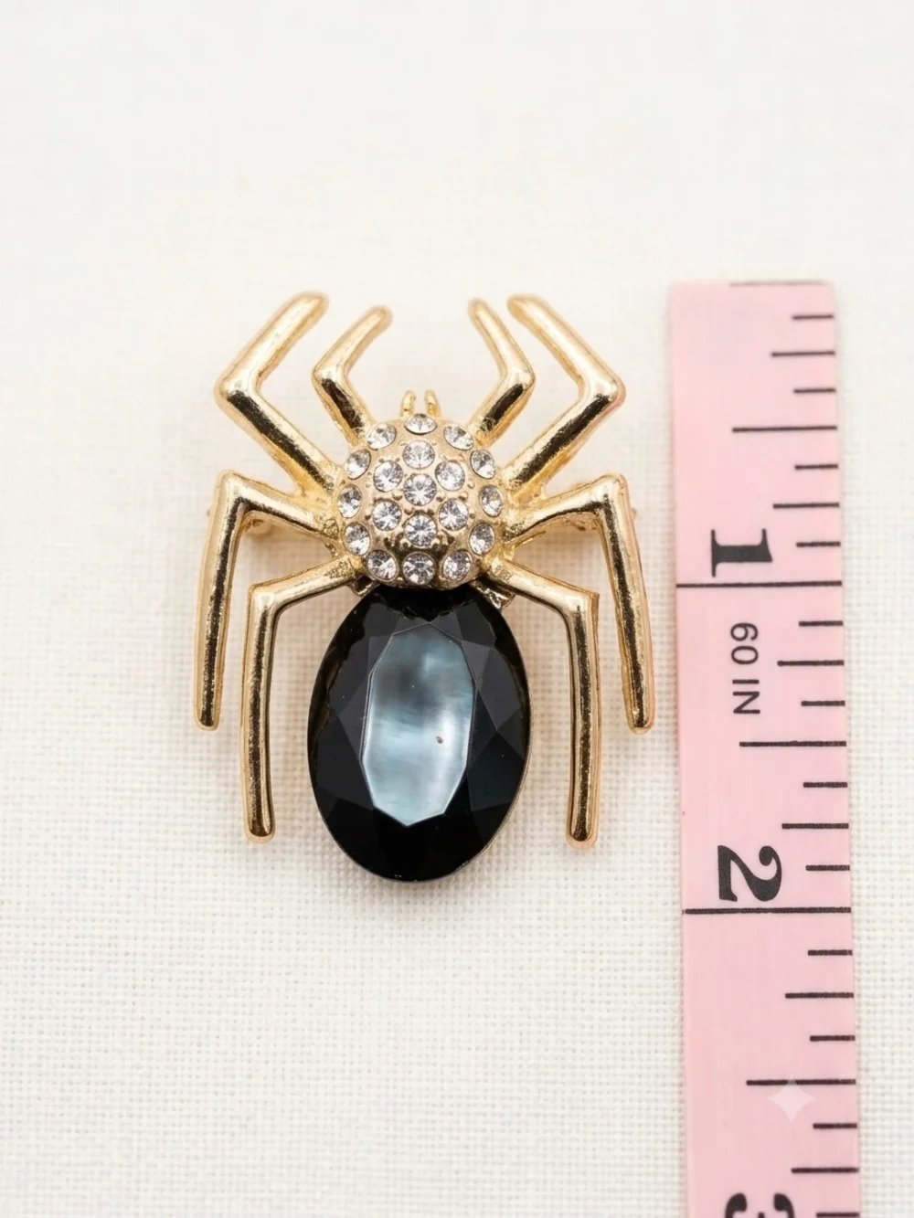 Gold Tone Spider Brooch with Black Gem Accent